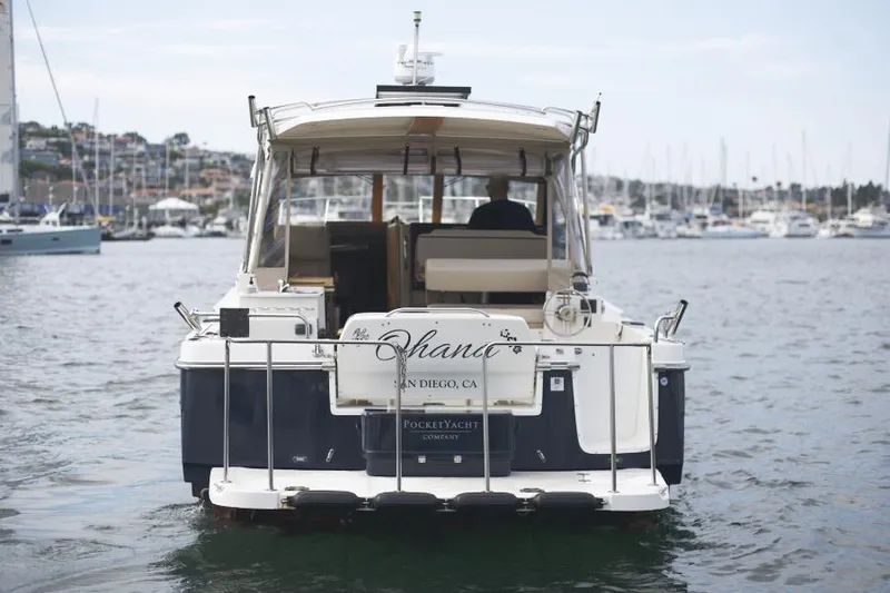 Slide: The Image of 2015 Cutwater 30 Sedan LE boat in harbor, rear view, San Diego. - 3
