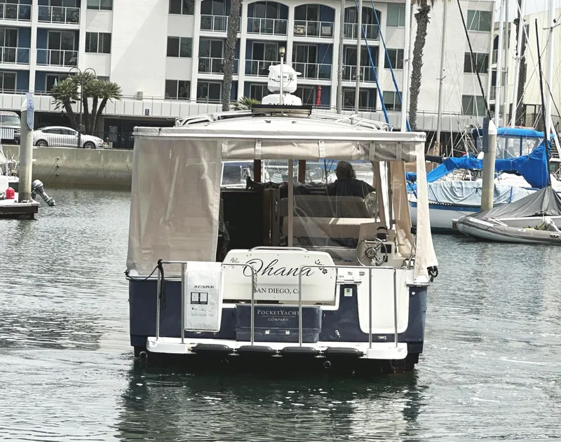 Slide: The Image of 2015 Cutwater 30 Sedan LE boat docked in marina, San Diego. - 8