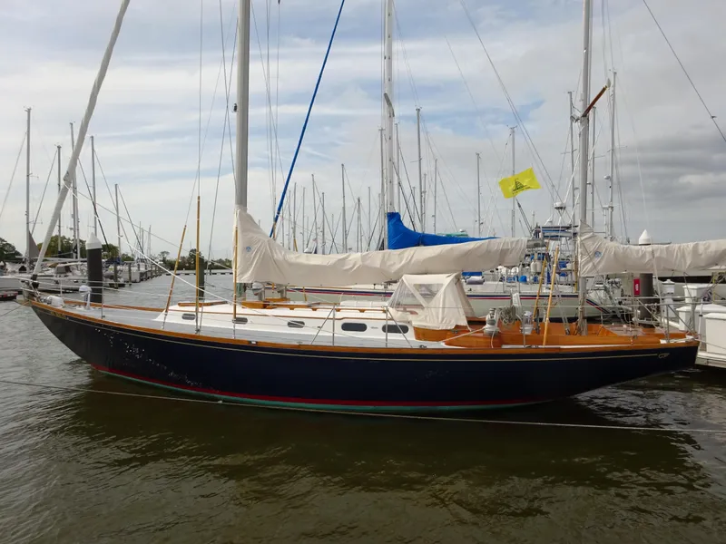 The Image of 1964 Hinckley Bermuda 40 Custom sailboat docked in a marina. - 0