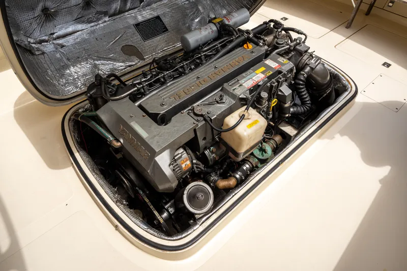 Slide: The Image of Engine compartment of a 1997 Hinckley Picnic Boat Classic, showcasing detailed mechanical components. - 44