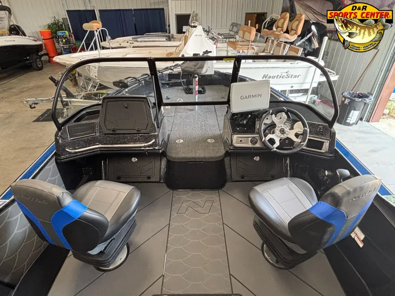 Slide: The Image of 2025 Nitro ZV20 Sport Pro boat interior with dual seats and Garmin navigation system. - 12