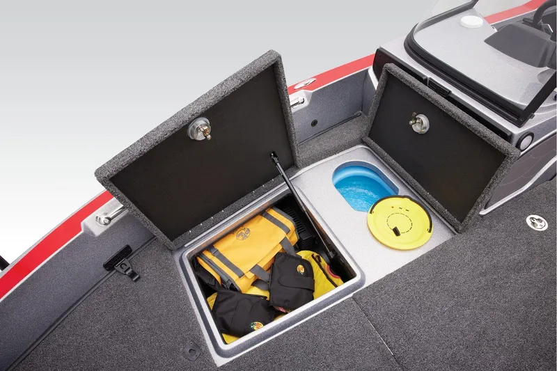 Slide: The Image of 2025 Nitro ZV20 Sport Pro boat storage compartments with life jackets and fishing gear. - 13