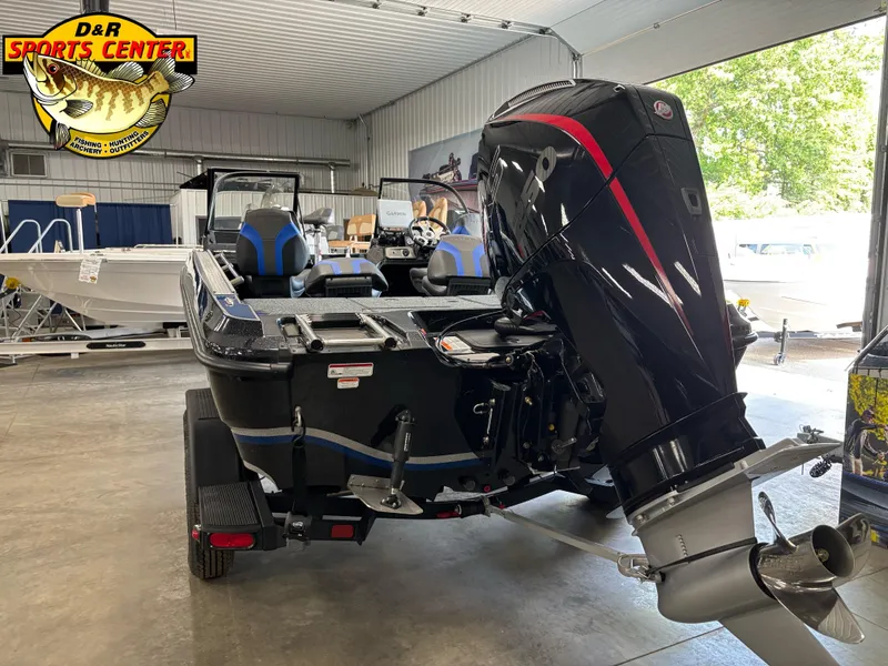 Slide: The Image of 2025 Nitro ZV20 Sport Pro boat in showroom, featuring powerful outboard motor. - 4