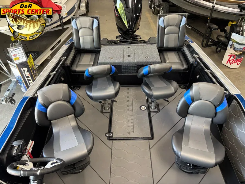 Slide: The Image of 2025 Nitro ZV20 Sport Pro boat interior with four gray and blue seats at D&R Sports Center. - 6