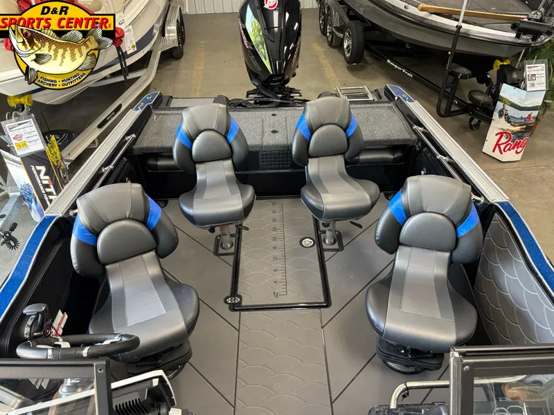 Slide: The Image of 2025 Nitro ZV20 Sport Pro boat interior with four gray and blue seats at D&R Sports Center. - 7