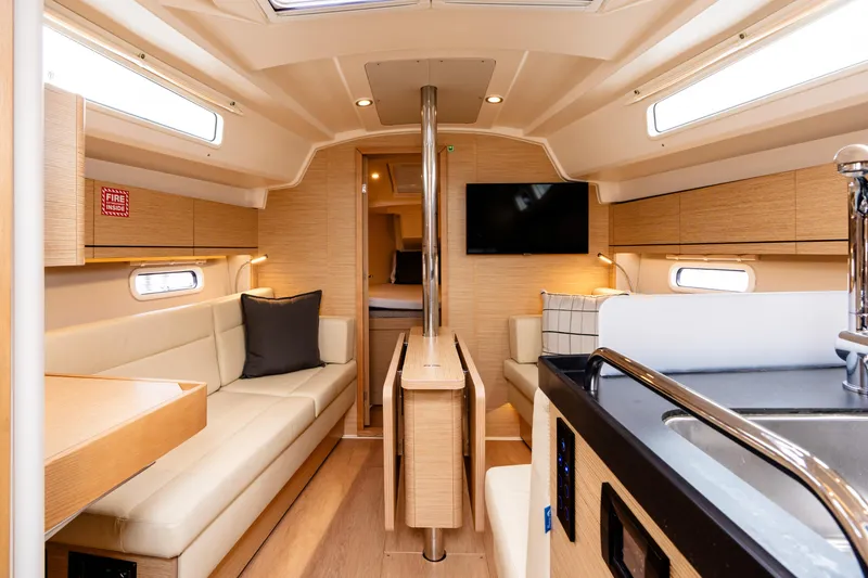 Slide: The Image of Interior of 2023 Hanse 348 yacht, featuring modern design and comfortable seating. - 30