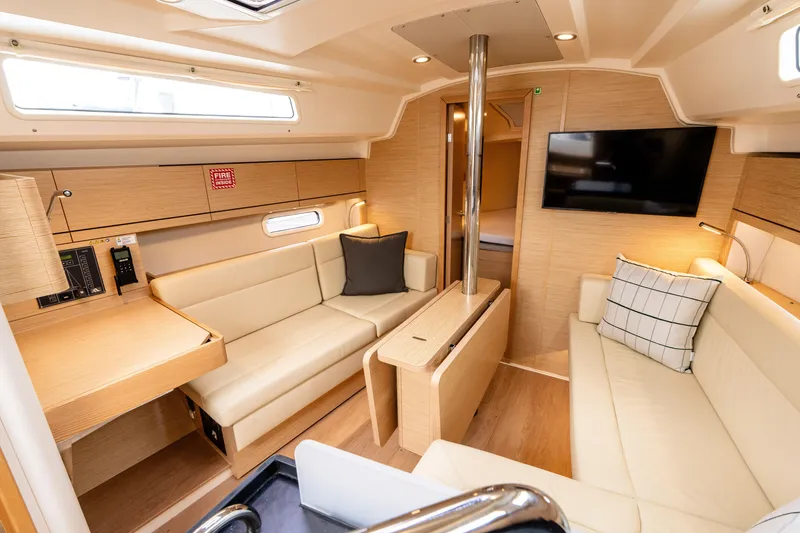 Slide: The Image of Luxurious interior of 2023 Hanse 348 yacht with modern seating and entertainment system. - 32