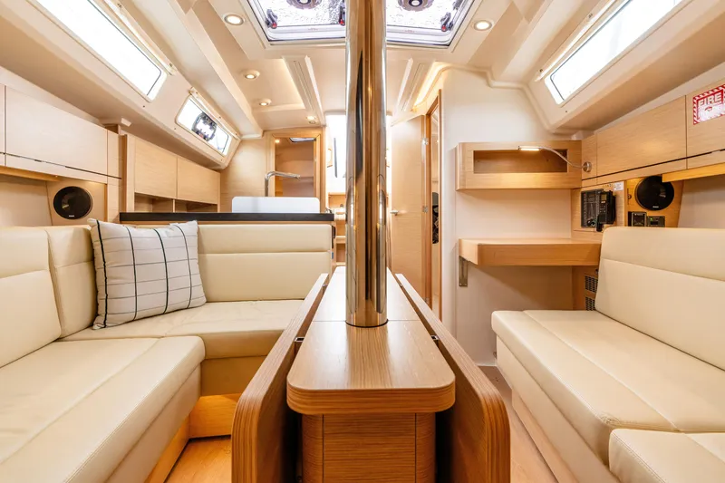 Slide: The Image of Luxurious interior of 2023 Hanse 348 yacht with modern furnishings and ample natural light. - 35