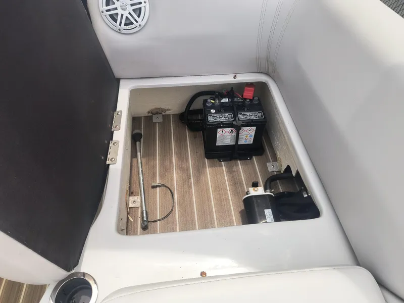 Slide: The Image of Battery compartment of 2017 Godfrey Sweetwater Premium Edition 255 SBH boat. - 11