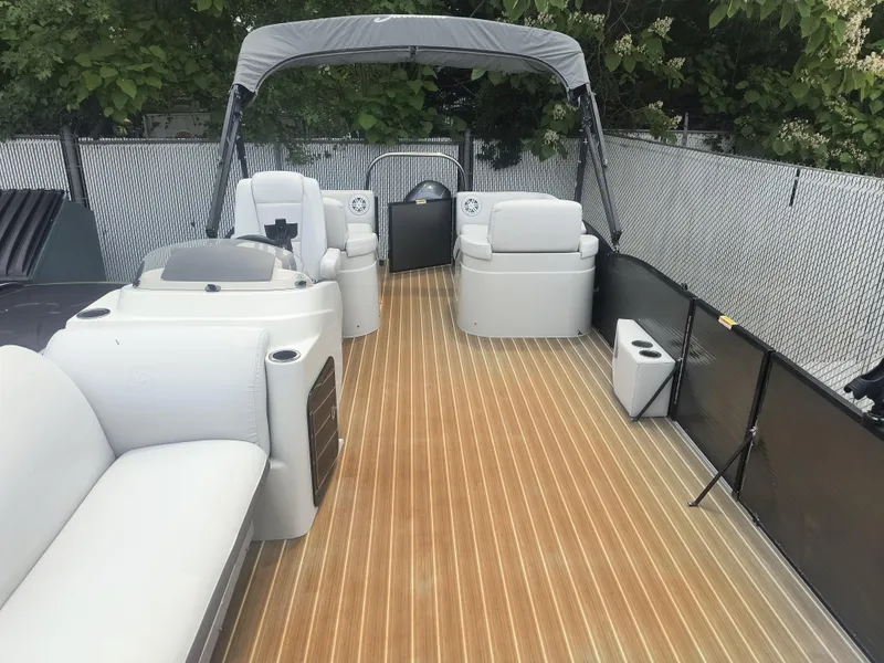 Slide: The Image of 2017 Godfrey Sweetwater Premium Edition 255 SBH pontoon boat with spacious seating and sleek design. - 8