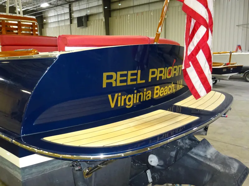 Slide: The Image of Hinckley T29C 2007 boat with "Reel Priority" name, Virginia Beach, VA, in a warehouse. - 15