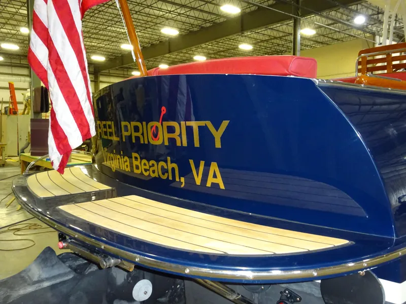 Slide: The Image of 2007 Hinckley T29C boat with "Reel Priority" name, Virginia Beach, VA, docked indoors. - 16