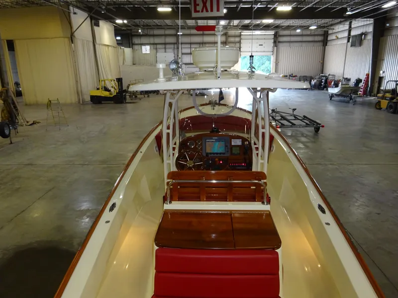 Slide: The Image of 2007 Hinckley T29C boat interior in a spacious warehouse setting. - 17