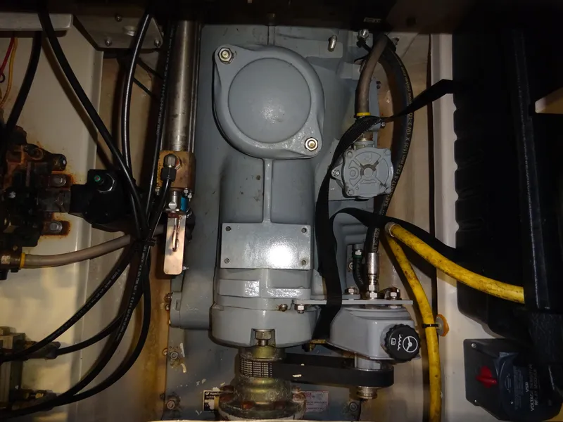 Slide: The Image of Engine compartment of a 2007 Hinckley T29C, showcasing mechanical components and wiring. - 42