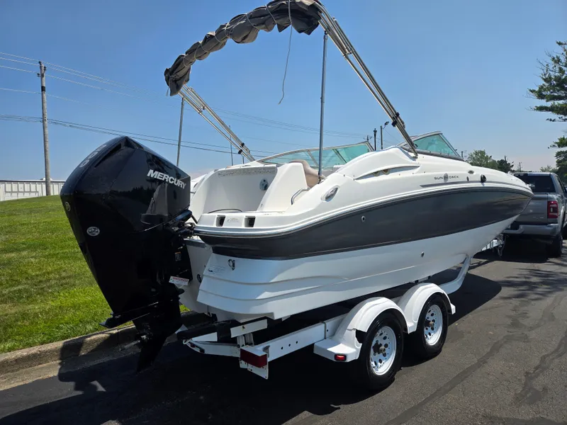 Slide: The Image of 2014 Hurricane SunDeck 2200 OB boat on trailer with Mercury outboard motor. - 3