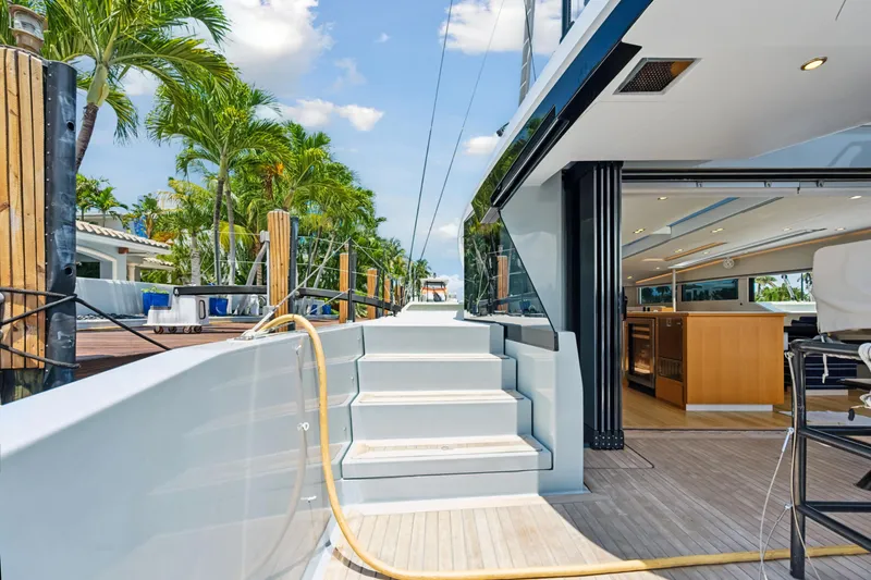 Slide: The Image of Luxurious 2019 McConaghy MC60 yacht with open deck and modern interior design. - 12