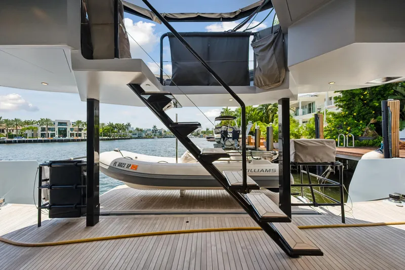 Slide: The Image of Luxury McConaghy MC60 yacht deck with stairs and tender, 2019 model. - 25