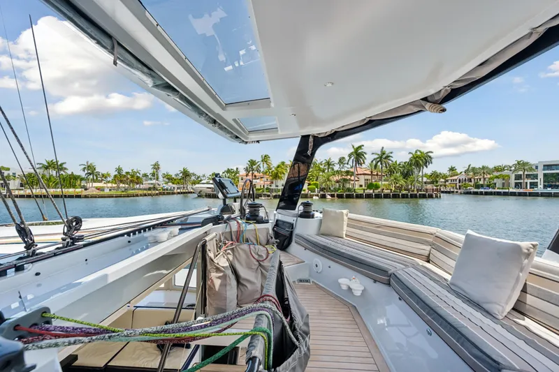 Slide: The Image of Luxurious 2019 McConaghy MC60 yacht deck with scenic waterfront view. - 28