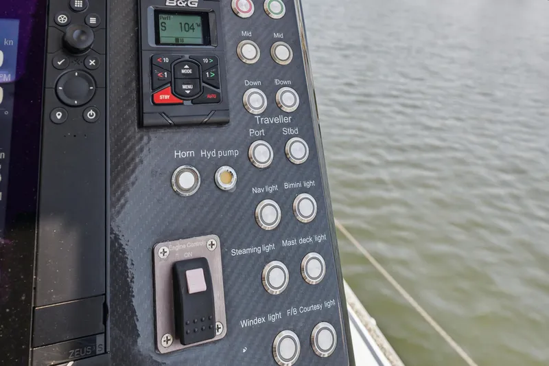 Slide: The Image of Control panel of a 2019 McConaghy MC60 yacht with various navigation buttons. - 31