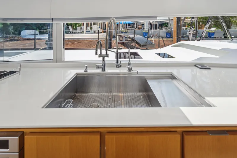 Slide: The Image of Modern kitchen sink on McConaghy MC60 yacht, 2019 model, with outdoor view. - 47