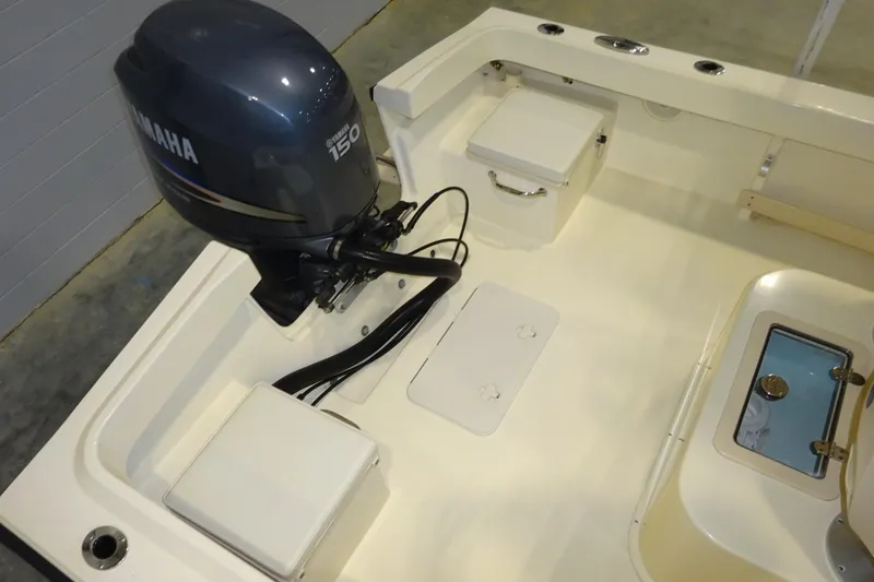 Slide: The Image of 2012 Parker 21 Special Edition boat with Yamaha 150 outboard motor. - 22