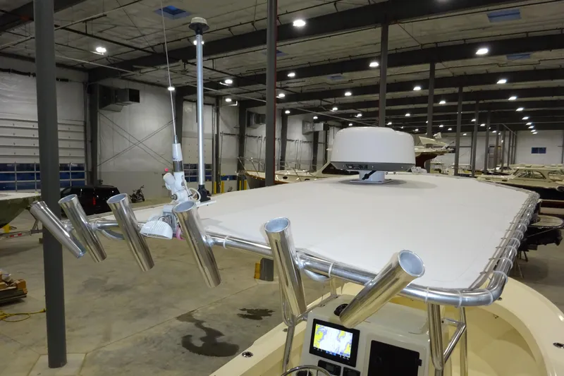 Slide: The Image of Parker 21 Special Edition boat, 2012 model, in a spacious indoor storage facility. - 39