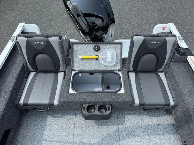 Slide: The Image of 2025 Lund 1775 Adventure Sport boat interior with seating and storage compartments. - 12