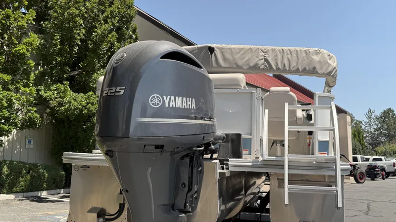 Slide: The Image of 2023 SunCatcher Select 322FC pontoon boat with Yamaha 225 outboard motor. - 4