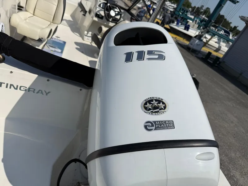 Slide: The Image of 2023 Stingray 191 DC boat with 115 horsepower engine, featuring premium and microplastic technology. - 3