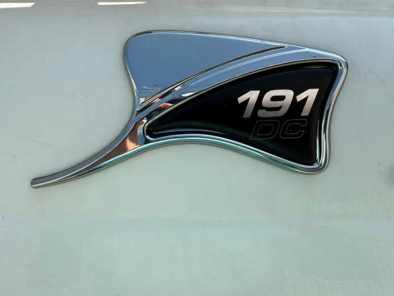 Slide: The Image of 2023 Stingray 191 DC emblem on a sleek, metallic surface. - 6
