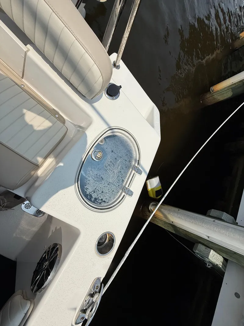 Slide: The Image of 2017 Sea Chaser 22 HFC boat interior with seating and water view. - 15