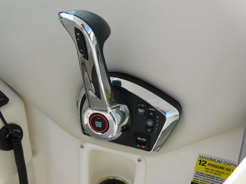 Slide: The Image of Throttle control of 2025 Sailfish 245 DC boat, featuring a sleek chrome finish. - 12