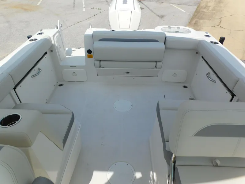 Slide: The Image of 2025 Sailfish 245 DC boat interior with spacious seating and modern design. - 16