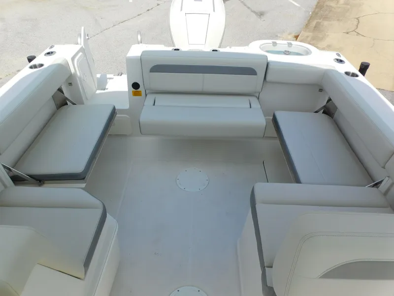 Slide: The Image of 2025 Sailfish 245 DC boat interior with spacious seating and modern design. - 22