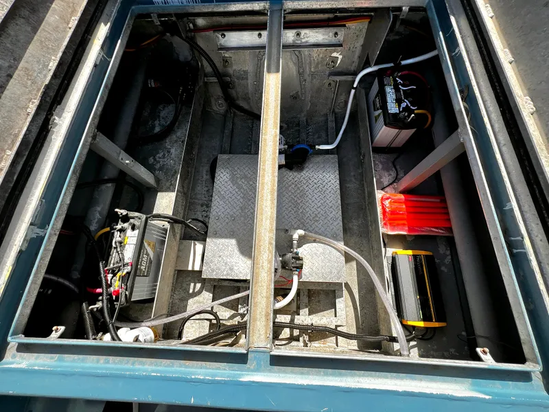 Slide: The Image of Interior view of ACB 30 model 2003, showcasing battery and electrical components. - 14