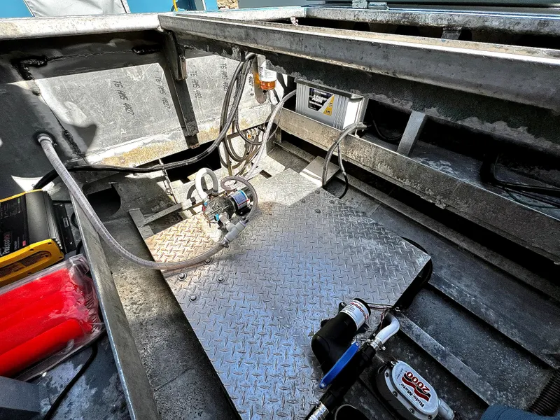 Slide: The Image of Interior of ACB 30 (2003) boat showing mechanical components and wiring. - 15