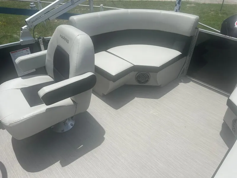 Slide: The Image of 2024 Harris FloteBote 210 Breeze interior with plush seating and modern design. - 15