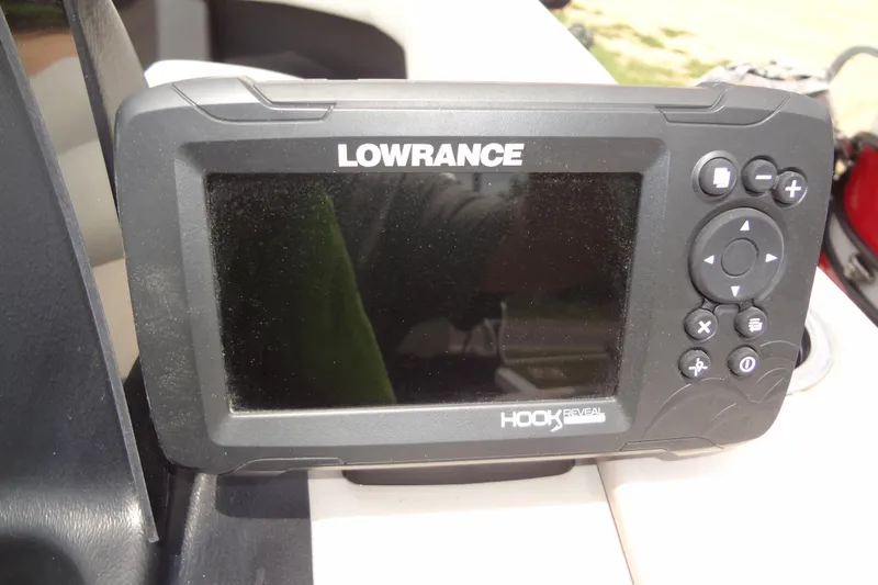 Slide: The Image of Lowrance Hook Reveal fish finder on 2024 Harris FloteBote 210 Breeze boat dashboard. - 19