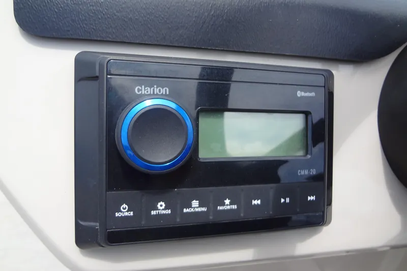 Slide: The Image of Clarion CMM-20 Bluetooth stereo system on 2024 Harris FloteBote 210 Breeze. - 21