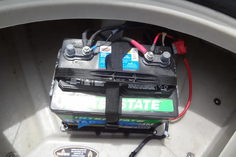 Slide: The Image of Battery compartment of 2024 Harris FloteBote 210 Breeze pontoon boat. - 26