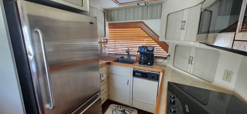 Slide: The Image of Hatteras 65 Convertible 1987 - 72