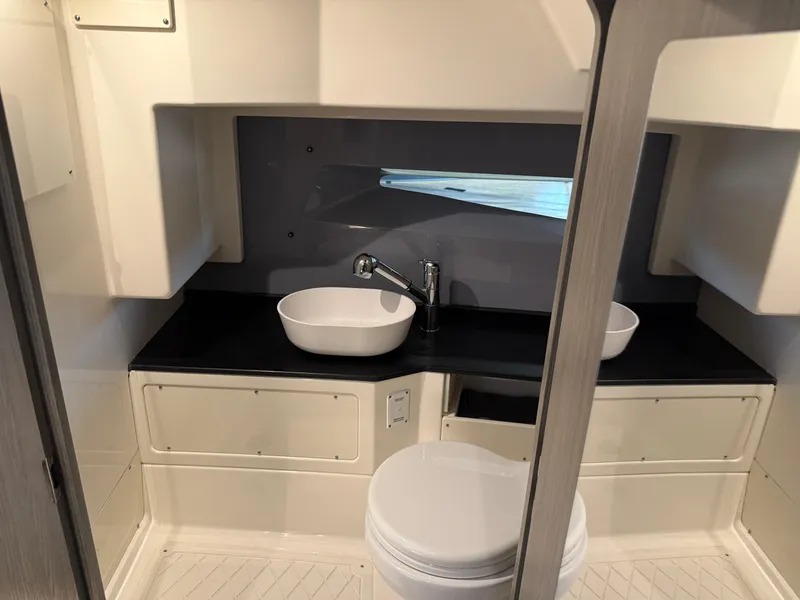 Slide: The Image of Modern bathroom interior in 2025 Navan C30, featuring sleek sink and compact toilet design. - 41