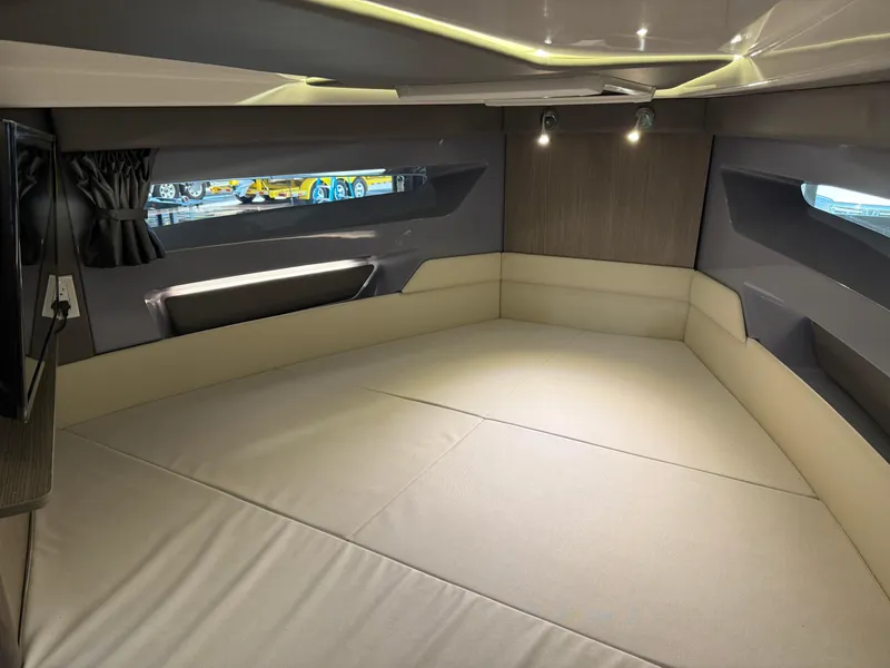 Slide: The Image of Interior cabin of 2025 Navan C30 boat with modern design and ambient lighting. - 45