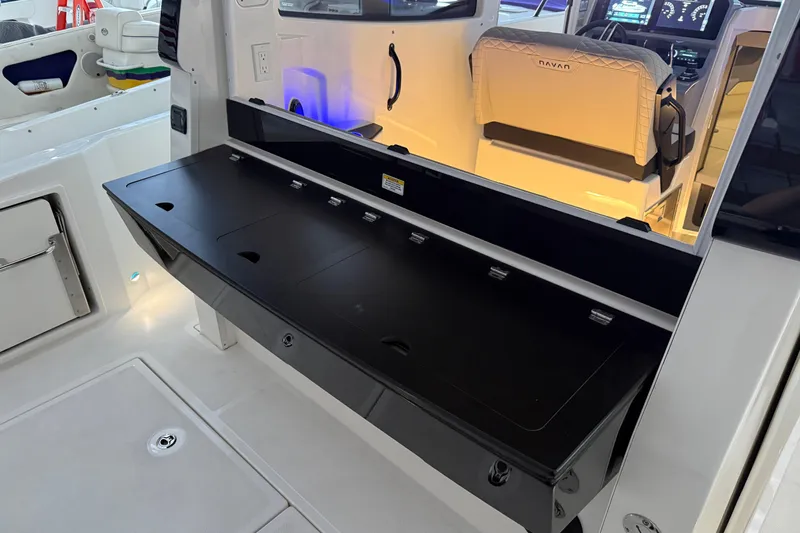 Slide: The Image of 2025 Navan C30 boat interior with foldable black table and illuminated cockpit. - 64