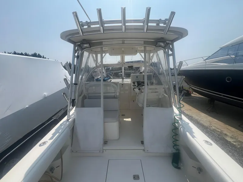 Slide: The Image of 2003 Albemarle 268 Express Fisherman boat, view of cockpit and helm station. - 17