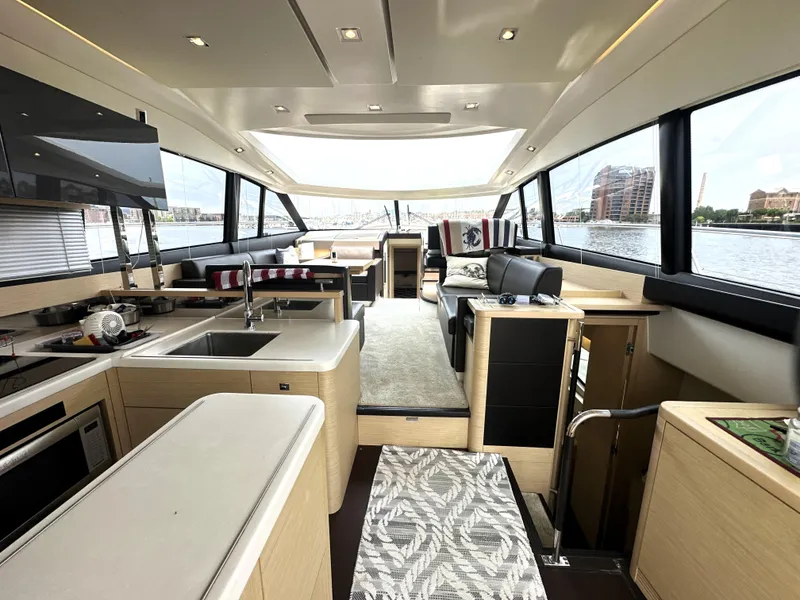 Slide: The Image of Luxurious interior of a 2017 Prestige 500 S yacht with modern amenities and waterfront view. - 11