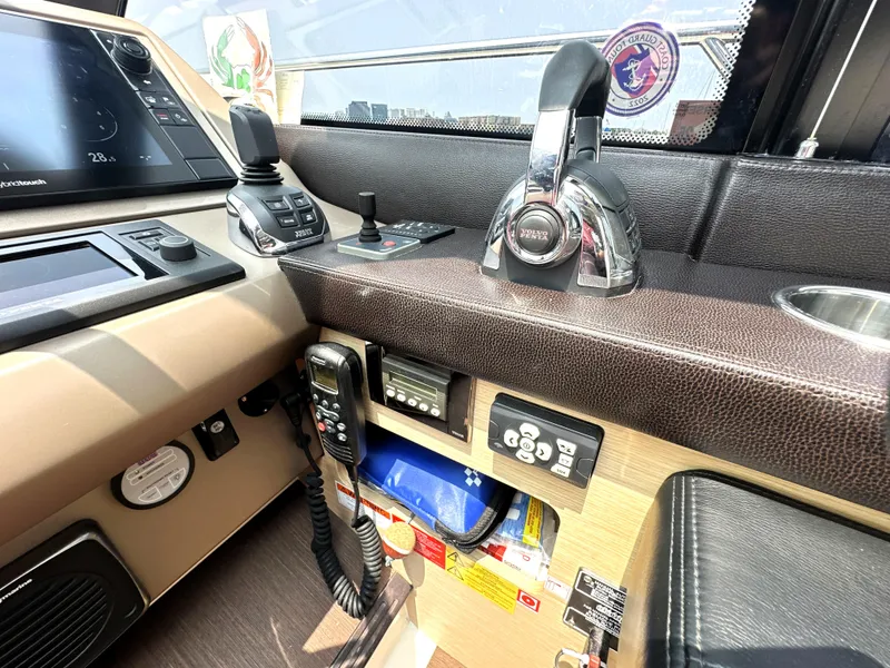 Slide: The Image of Control panel of a 2017 Prestige 500 S yacht with navigation equipment. - 27