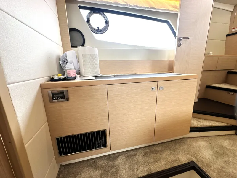 Slide: The Image of Interior of 2017 Prestige 500 S yacht with wooden cabinetry and modern design. - 41