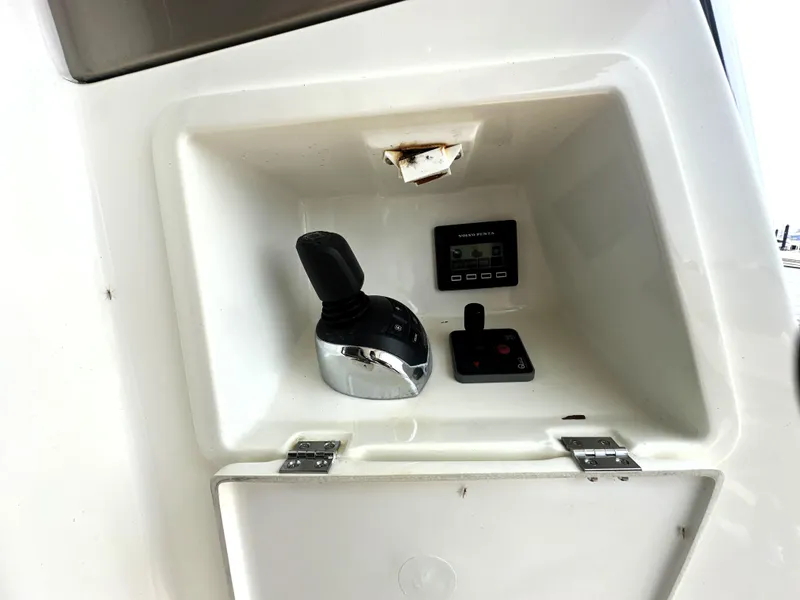 Slide: The Image of Control panel of a 2017 Prestige 500 S yacht, featuring joystick and display. - 7