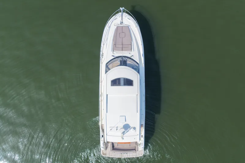 Slide: The Image of Aerial view of 2017 Prestige 500S yacht cruising on calm water. - 11